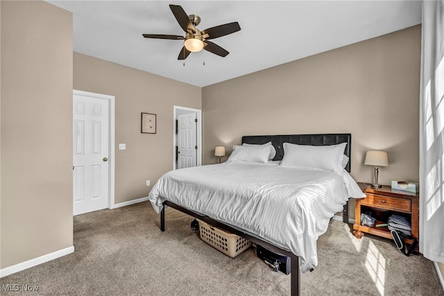 bedroom featuring baseboards, carpet floors, and ceiling fan