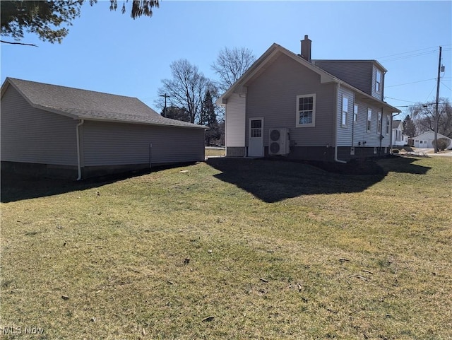 view of property exterior with ac unit, a lawn, and a chimney