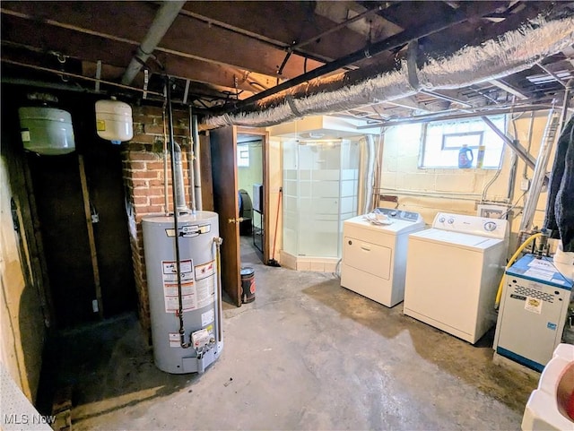 below grade area with washer and dryer and gas water heater