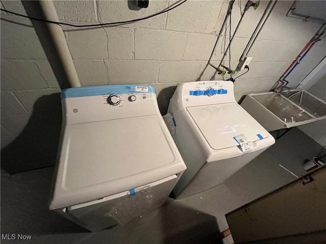 laundry area featuring independent washer and dryer