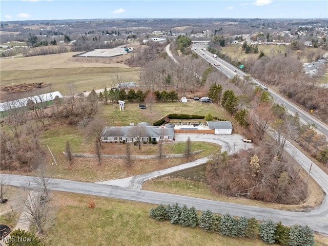 birds eye view of property featuring a rural view