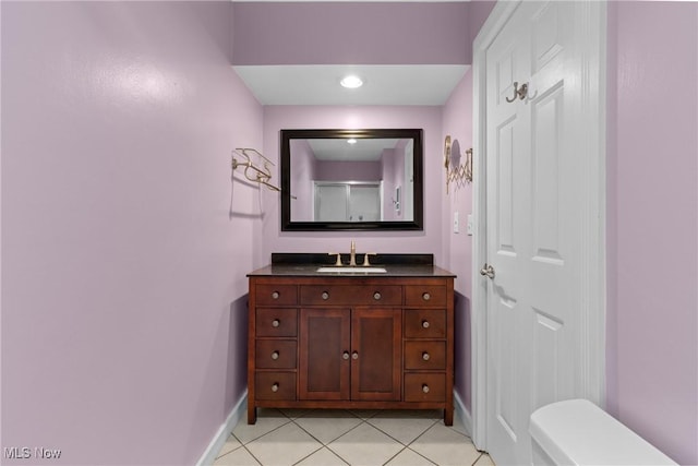 bathroom with tile patterned flooring, baseboards, toilet, recessed lighting, and vanity