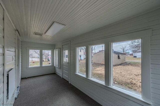 view of unfurnished sunroom
