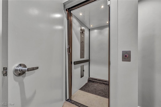 bathroom featuring elevator