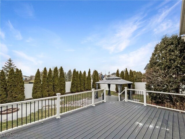 wooden deck with a gazebo