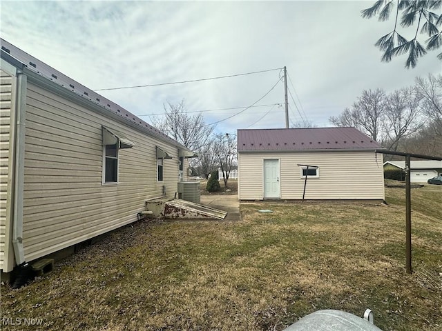 view of yard featuring central AC