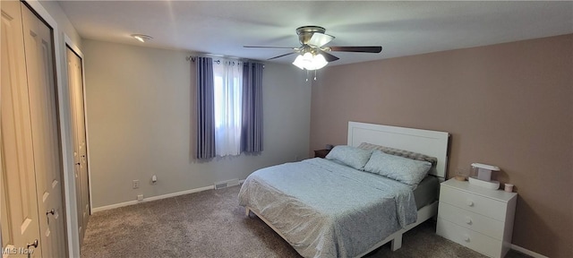 bedroom with baseboards, carpet, and a ceiling fan