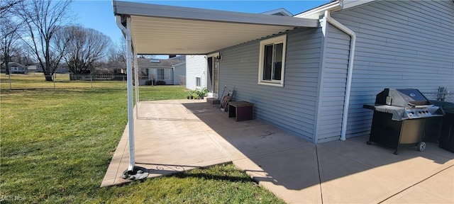 view of patio / terrace featuring grilling area, entry steps, and fence