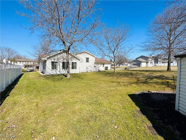 view of yard with fence