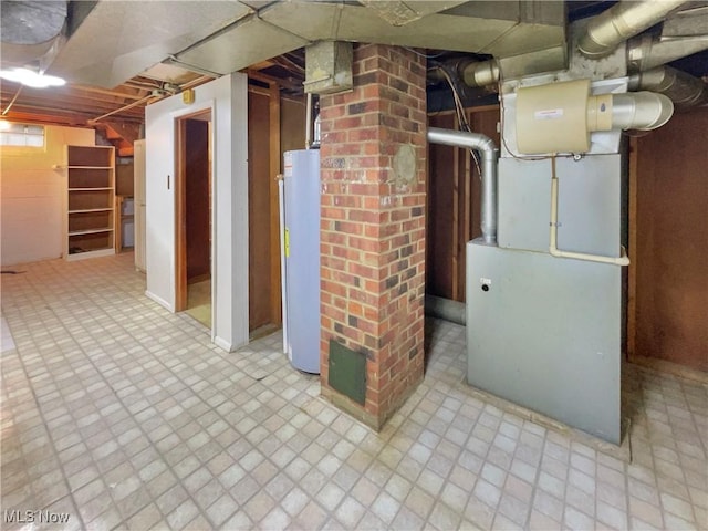 unfinished below grade area with gas water heater, heating unit, and light floors