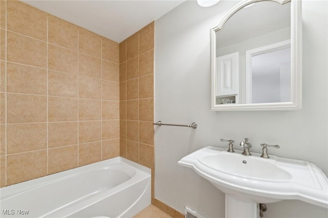 full bathroom featuring a sink and shower / bath combination