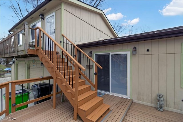 wooden terrace featuring stairs