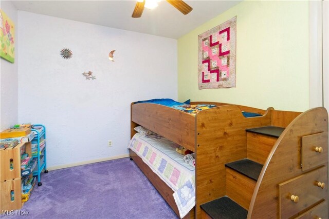 bedroom with carpet flooring, a ceiling fan, and baseboards