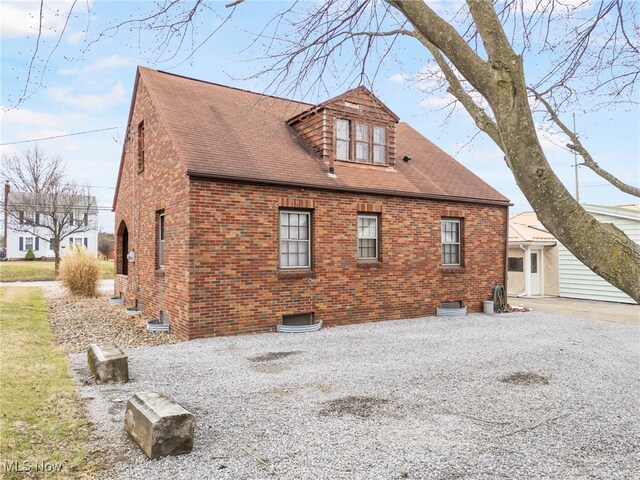 537 Main St, Navarre, OH 44662 - view of side of property with brick siding