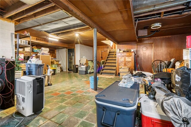537 Main St, Navarre, OH 44662 - unfinished below grade area with stairway and wooden walls