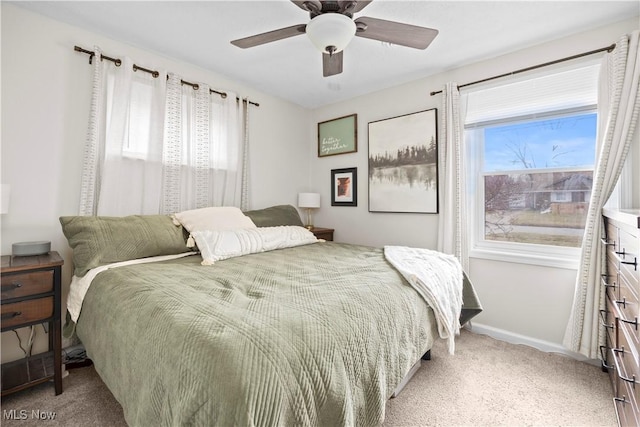 bedroom featuring carpet flooring, ceiling fan, and baseboards