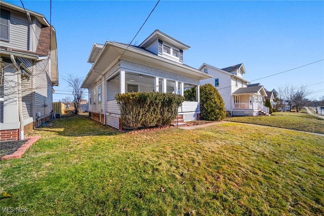 view of front of property with a porch and a front yard