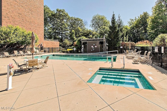 27500 Cedar Rd Unit 804, Beachwood, OH 44122 - community pool featuring a patio and view of scattered trees