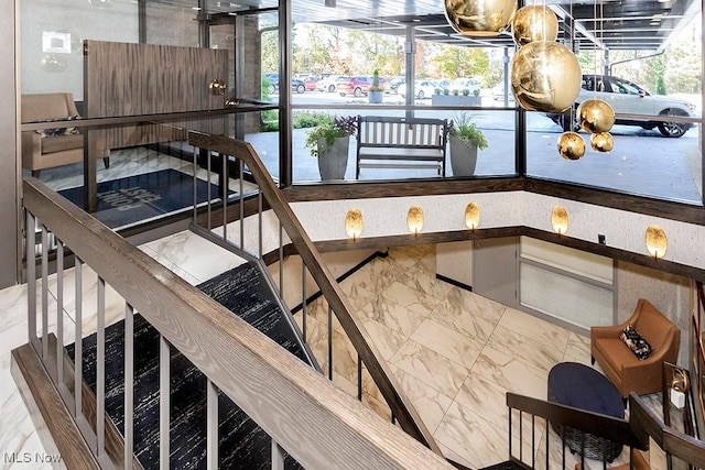 27500 Cedar Rd Unit 804, Beachwood, OH 44122 - stairs featuring marble look tile flooring