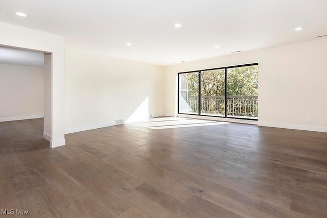 27500 Cedar Rd Unit 804, Beachwood, OH 44122 - spare room with wood finished floors, baseboards, and recessed lighting