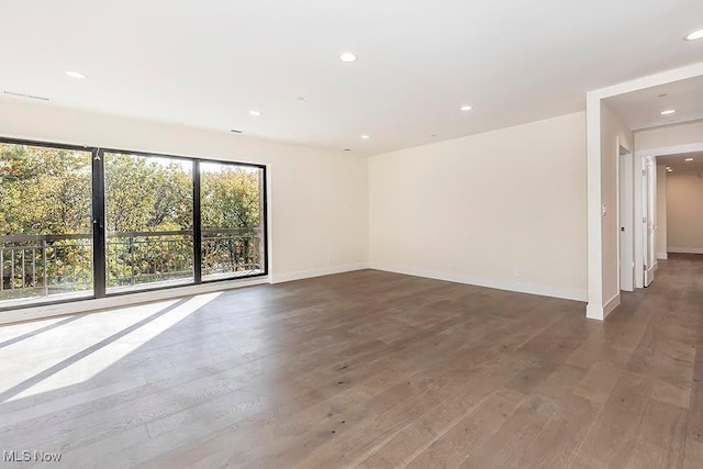 27500 Cedar Rd Unit 804, Beachwood, OH 44122 - spare room featuring wood finished floors, recessed lighting, and baseboards