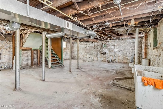 unfinished basement with visible vents