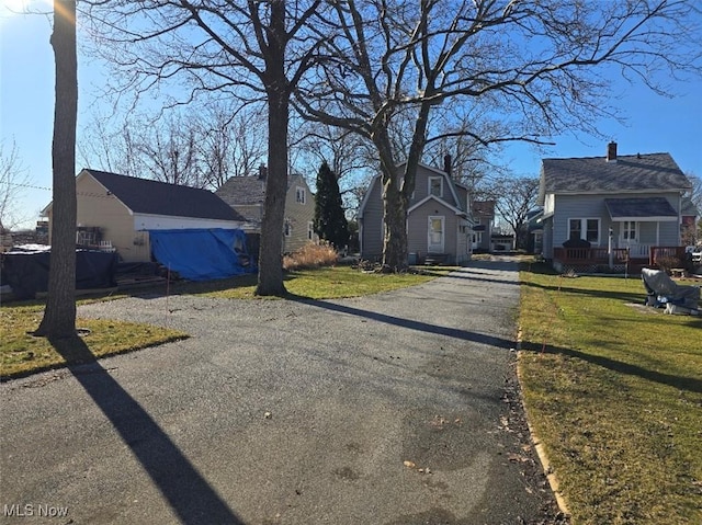 view of road featuring a residential view