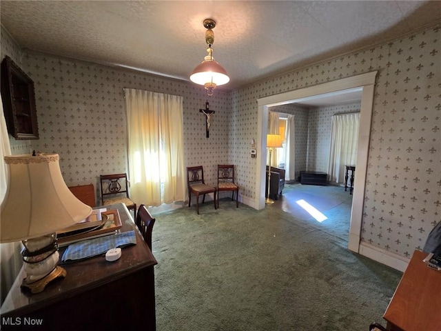 interior space with carpet floors and wallpapered walls