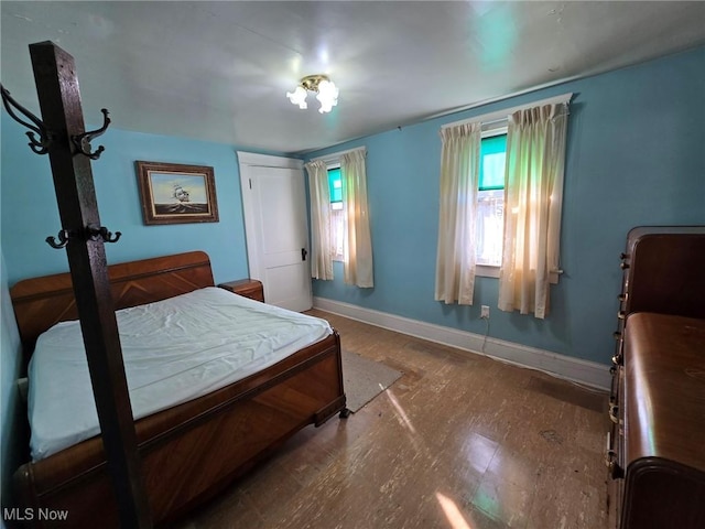 bedroom with baseboards