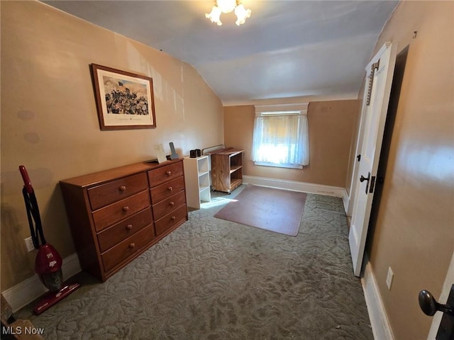 additional living space featuring baseboards, carpet, and lofted ceiling