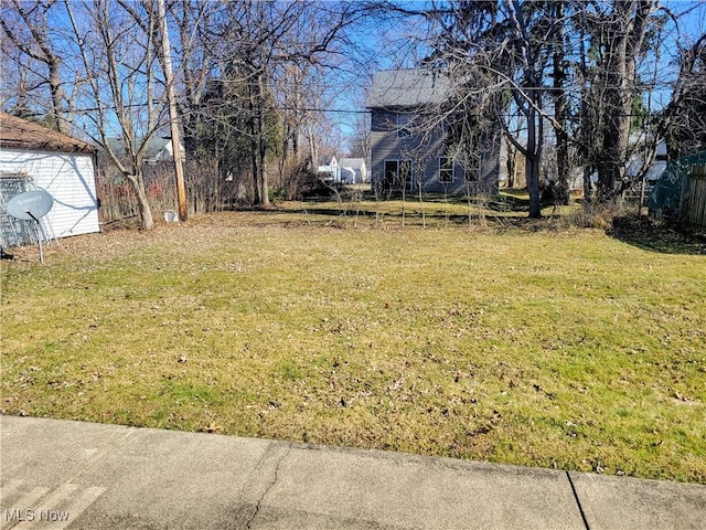 view of yard with fence