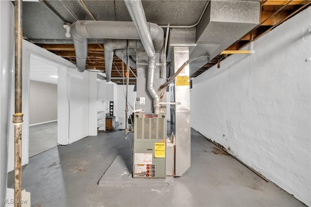 utility room with heating unit