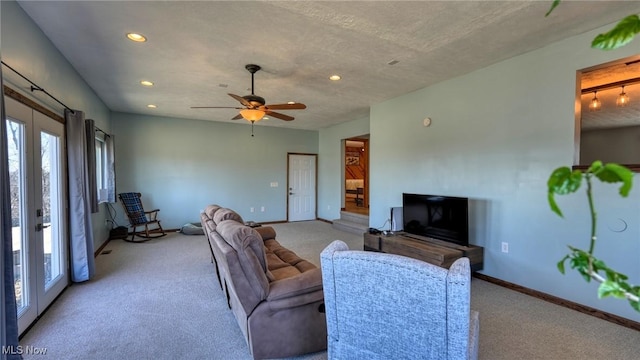 living area with recessed lighting, french doors, baseboards, and carpet floors