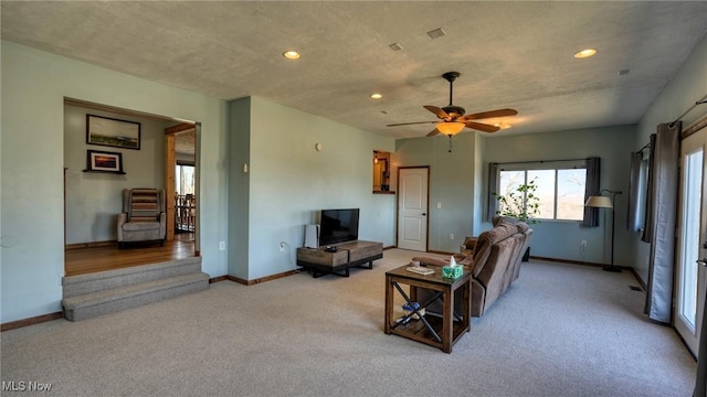 440 Homestead Dr, New Concord, OH 43762 - living room with baseboards, recessed lighting, plenty of natural light, and light colored carpet