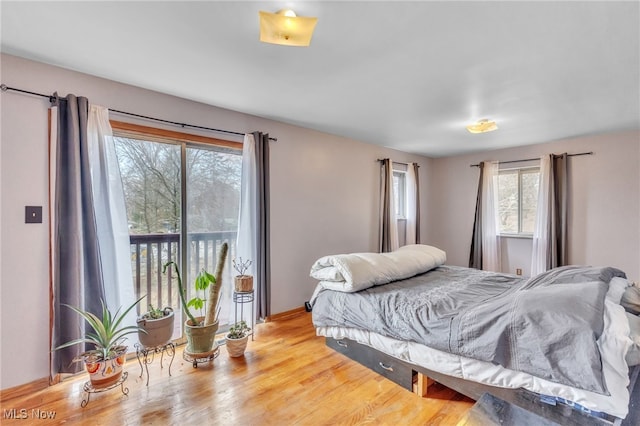 bedroom with wood finished floors