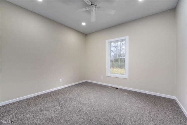 carpeted empty room with recessed lighting, baseboards, visible vents, and ceiling fan