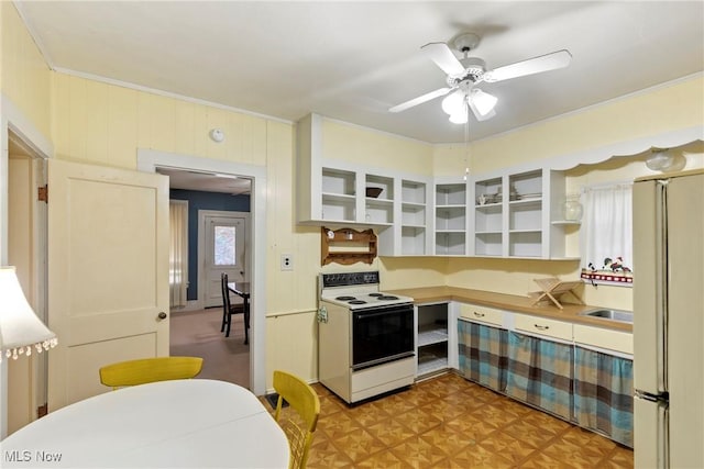 kitchen featuring white appliances, a ceiling fan, light floors, open shelves, and ornamental molding