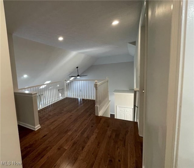 additional living space featuring a ceiling fan, vaulted ceiling, recessed lighting, and wood finished floors