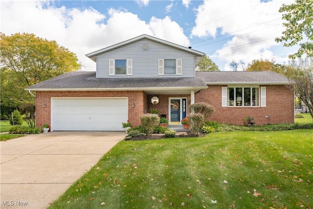 view of front of home featuring brick siding, driveway, a front yard, and roof with shingles