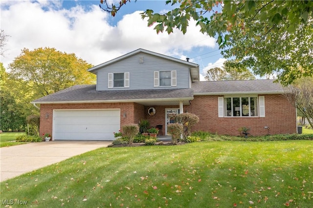 view of front of house with brick siding, an attached garage, concrete driveway, and a front lawn