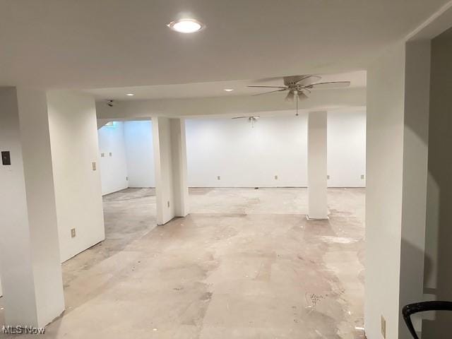 basement featuring recessed lighting and a ceiling fan