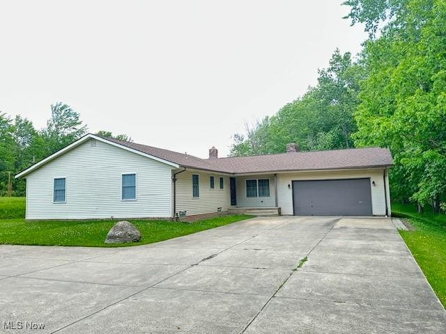 2364 W Royalton Rd, Broadview Heights, OH 44147 - ranch-style home with driveway, a garage, and a chimney