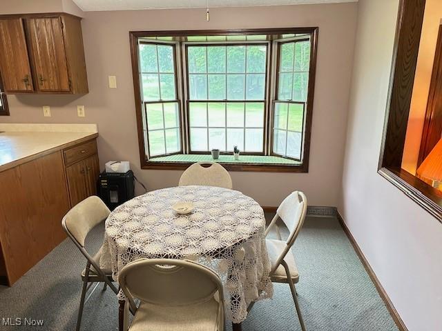 2364 W Royalton Rd, Broadview Heights, OH 44147 - carpeted dining room featuring baseboards