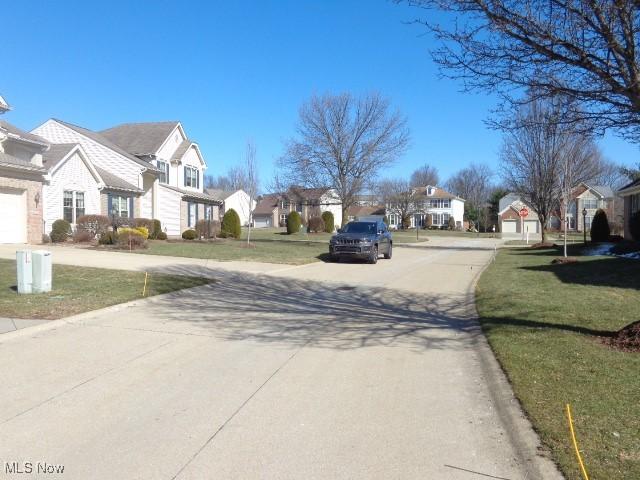 view of road with a residential view