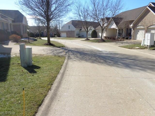 view of road with a residential view