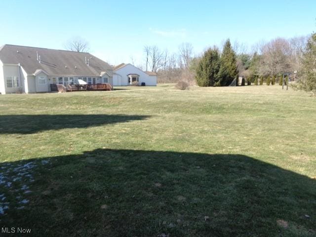 view of yard featuring a deck