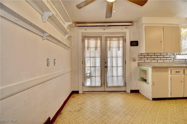 entryway with french doors, baseboards, light floors, and a ceiling fan