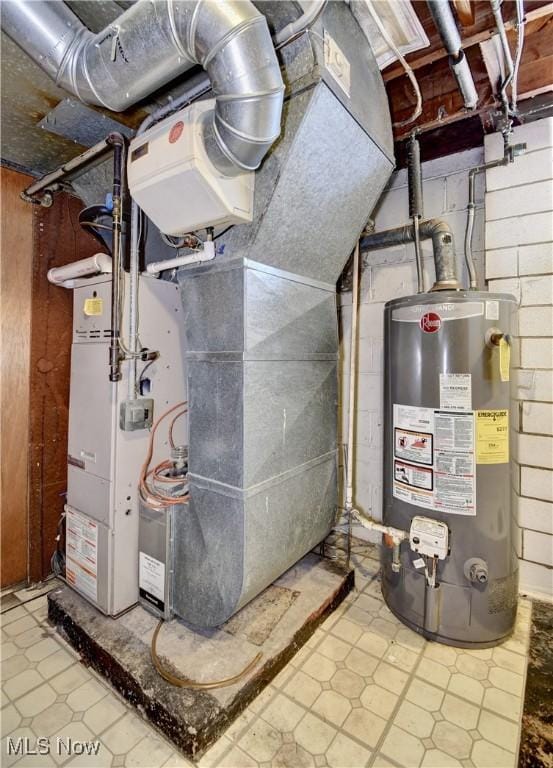 utility room with gas water heater