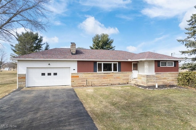 ranch-style house featuring aphalt driveway, a front yard, a chimney, a garage, and stone siding