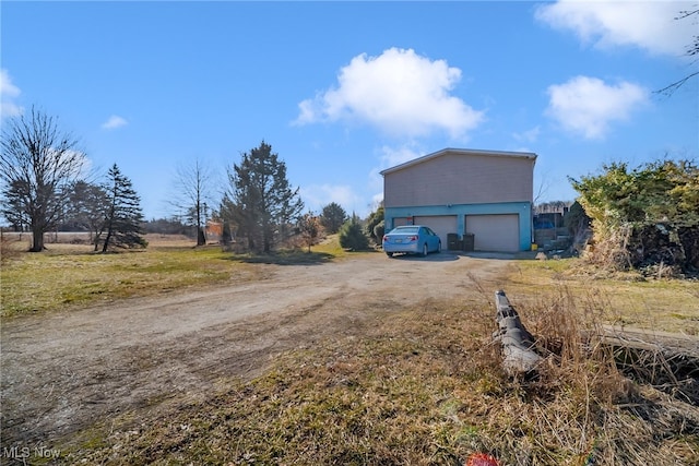 view of street featuring driveway